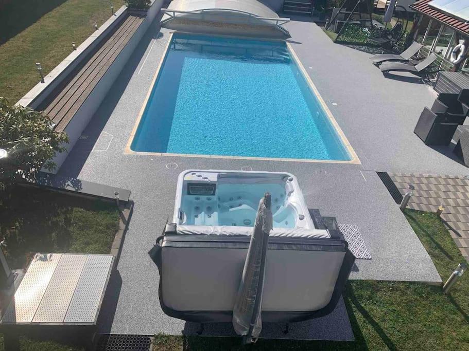 Chalet 2 Personnes Avec Jacuzzi Et Piscine Saisonniere Partagee Corcieux ภายนอก รูปภาพ